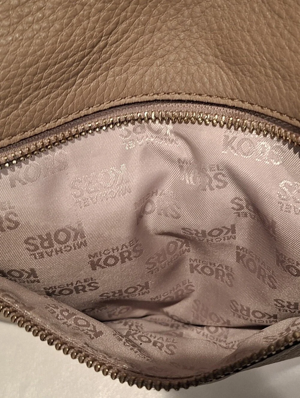 Michael Kors Beige Pebbled Leather Hobo with Tassel Charm